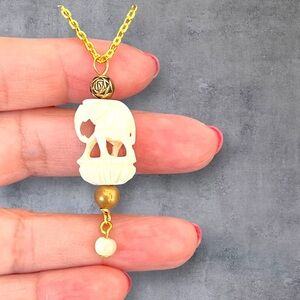 Elephant pendant & gold plated necklace carved design